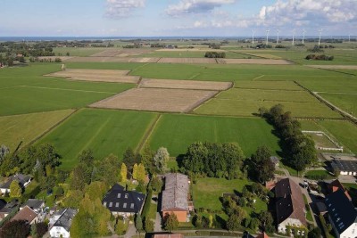 Nordsee-Idylle in Tossens - sehr umfangreich saniertes Reihenendhaus mit Balkon und Garten