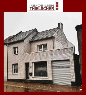 TOP – gepflegtes Reihenmittelhaus mit großer Garage und Garten in zentraler Lage von Übach-Palenberg