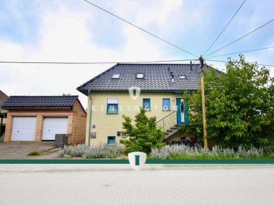 Großzügiges Zweifamilienhaus mit Vermietungspotenzial, Garten und Pool in begehrter Lage von Barby