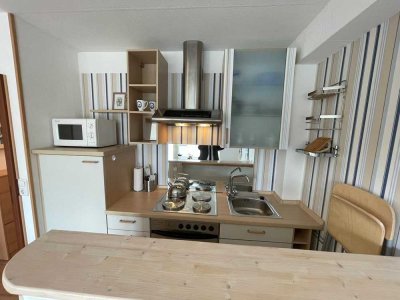 Geschmackvolle, möblierte 1-Zimmer-Wohnung mit Balkon und EBK in Glücksburg (Ostsee)