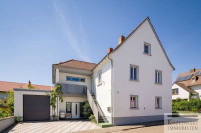 Familienidylle in gefragter Weinlage – Charmantes Haus mit Ferienwohnung!