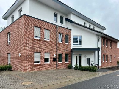 Erstbezug: Zentral gelegene 4-Zimmer-Obergeschosswohnung mit Einbauküche und Aufzug