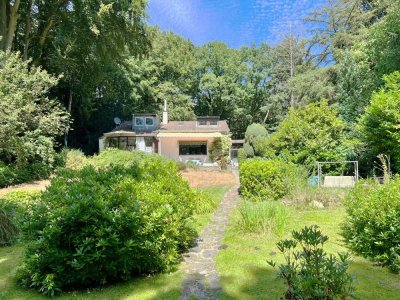 Einzigartiges Haus mit großem Waldgrundstück, Indoor-Pool und See