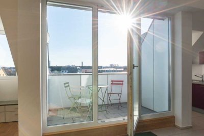 Lichtdurchflutete Dachgeschosswohnung mit Sonnenterrasse und Alpenblick