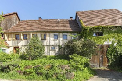 Sanieren oder Abreißen: Großzügiger Bauernhof in naturnaher Ortsrandlange von Börtlingen