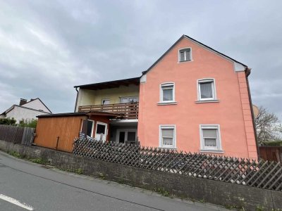 Tatkräftige Käufer gesucht: Einfamilienhaus mit Anbau und Einzelgarage