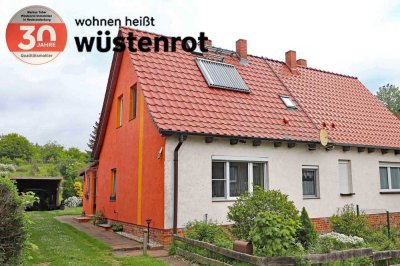 DOPPELHAUSHÄLFTE MIT SOLARTHERMIE + KELLER + CARPORT AUF EINEM GROSSEM UND HERRLICHEM GRUNDSTÜCK