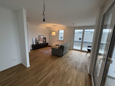 Möblierte Neubau 2-Zimmer-Wohnung 2. OG mit Dachterrasse und Loggia