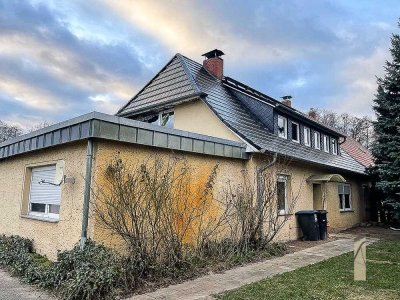 Einfamilienhaus mit Nebengelass und Gewerbeflächen