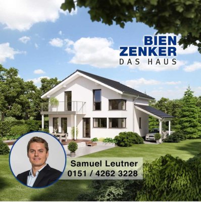 Bien-Zenker: Modernes Einfamilienhaus mit Satteldach und Carport in Mauer