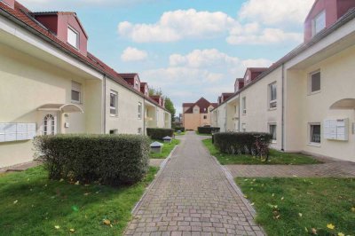 Vermietete 2-Zi.-DG-Whg. mit Balkon und TG-Stellplatz in See- und Golfplatznähe