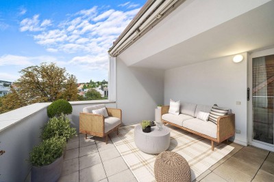 Helle Dachgeschosswohnung mit sonniger Terrasse und Erweiterungspotential