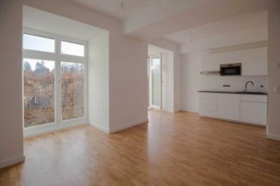 Barrierearme Erdgeschosswohnung mit Terrasse und kleiner Grünfläche