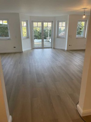 Wunderschöne, renovierte Wohnung mit Garten, Garage und einem zusätlichen Apartment im Keller