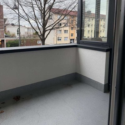 Ideal für Urbanität und Komfort! Modernisierte 3-Zimmer-Wohnung mit Balkon