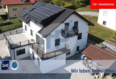 RESERVIERT!
MODERNES 3-FAMILIENHAUS MIT PV-ANLAGE