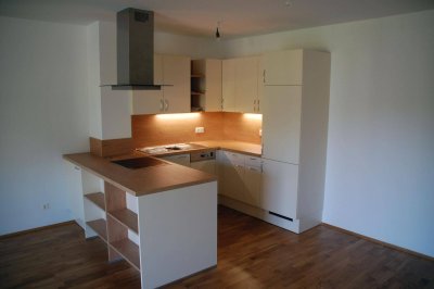 3 Zimmer Neubauwohnung mit Balkon, Nähe ISTA