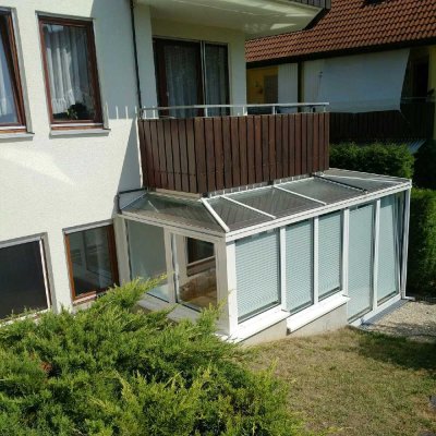 Sehr schöne, modernisierte 2-Zimmer-Erdgeschoß-Wohnung mit Wintergartenanbau, Sauna und Garage