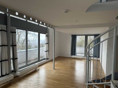 Geräumige 4-Zimmer-Penthousewohnung mit umlaufender Dachterrasse und schöner Aussicht