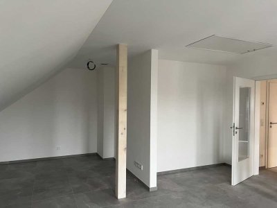 Neu ausgebaute Dachgeschosswohnung mit Weitblick