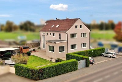 Großzügiges Mehrfamilienhaus mit Garten, Pool und Sommerküche in besonderer Lage