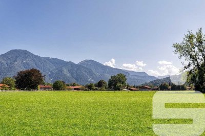 Großzügige Gartenwohnung mit unverbaubaren Bergblick in bester Lage von Rottach-Egern