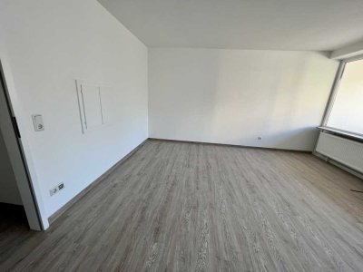 Erstbezug nach Sanierung: Zentrale 2-Zimmerwohnung mit Balkon und Stellplatz