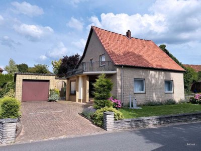 Einmaliges Einfamilienhaus mit Traumgarten, Garage und Wintergarten