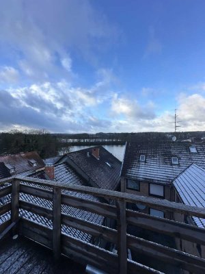 ++Charmante Dachgeschosswohnung mit 2 Etagen, Dachterrasse und Seeblick – Direkt im Zentrum von Möll