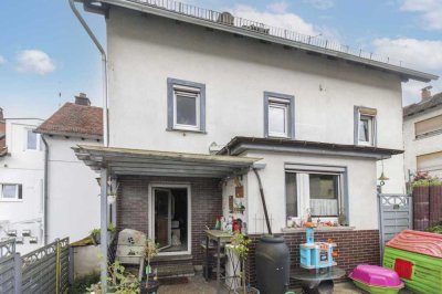 Kommen Sie in den Genuss von kompaktem Wohnen: EFH mit Garten und  Garage in Schmitten