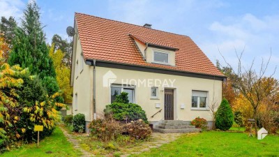 Attraktives Zweifamilienhaus mit 6 Zimmern, EBK und Garage in Lotte