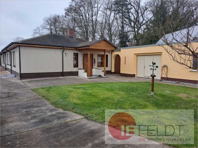 Moderne & gepflegte Doppelhaushälfte im Bungalow-Stil mit Garage, schönem Garten und Werkstatt