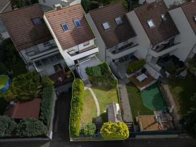 Charmantes Reihenmittelhaus – Familienfreundlich mit Garten und Garage am unteren Steinberg