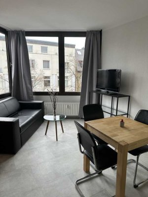 Frisch saniertes 1,5-Zimmer-Apartment (30 m²) mit Ankleidezimmer, Einbauküche & Tiefgarage