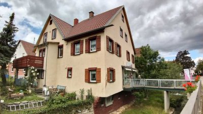 Wohn- und Geschäftshaus mit großem Ausbaupotential in zentraler Lage