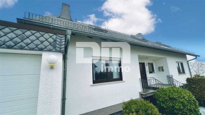 Modernisierte barrierearme EG-Wohnung im Bungalowstil mit Gartenanteil, Balkon und Garage