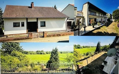 Einfamilienhaus mit toller Aussicht in die unverbaute Natur  inkl. vermietete Einliegerwohnung