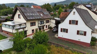 Exklusives Immobilienangebot: Zwei Einfamilienhäuser auf Traumgrundstück mit Pool und Garage