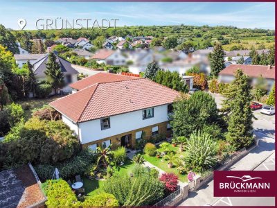 Gute Lage, schöner Garten: L-förmiger Bungalow in Massivbauweise auf großzügigem Grundstück!