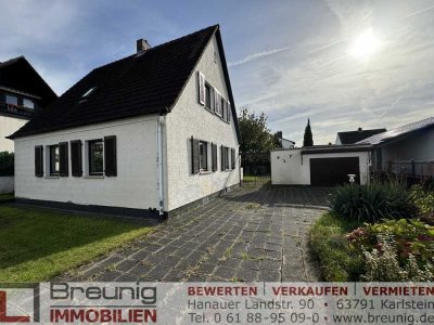 Sanierungsbedürftiges, freistehendes EFH mit großzügigem Grundstück & Garage in zentraler Lage