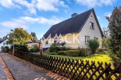 Familientraum mit Weitblick: Großzügiges Einfamilienhaus mit idyllischem Garten in ruhiger Lage