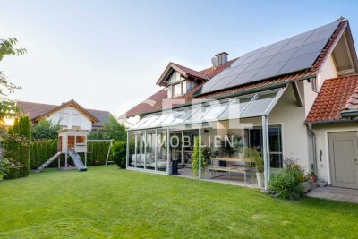 Stylisches Einfamilienhaus mit gepflegtem Garten und Doppelgarage