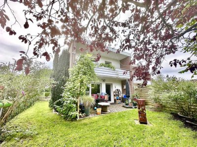 Geschützt liegendes Reihenendhaus mit Garage und idyllischem Garten in Bad Zwischenahn- Aschhausen