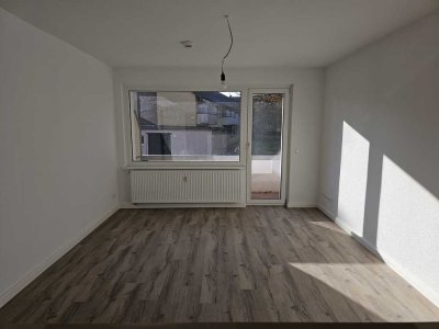 3 Zimmer-Wohnung mit Balkon im Erdgeschoss, Erstbezug nach Vollmodernisierung