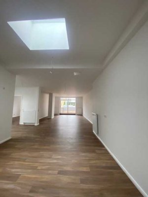 Loftartige 2-Raumwohnung mit Terasse und der Option auf einen PKW-Stellplatz