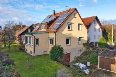 Großzügiges Familienhaus mit Gartenidylle und vielseitigen Nutzungsmöglichkeiten