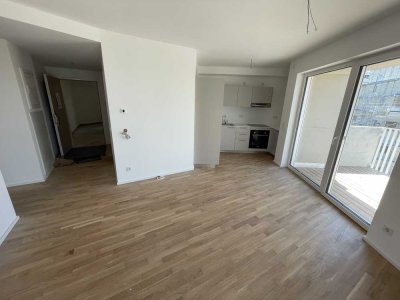 Neubau- 4-ZKB-Wohnung mit Einbauküche und Balkon