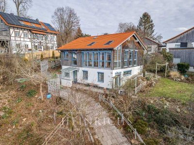 Einfamilienhaus in Hanglage: Ruhe, Komfort und Natur genießen