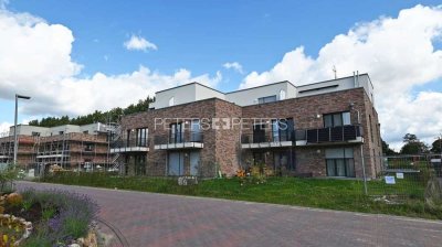 Leben im Herzen von Hasloh: Neubau mit Stil und Komfort