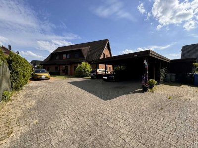 Mehrfamilienhaus in bester Wohnlage mit 4 Wohnungen, 6 PKW-Stellplätzen, Terrassen, Garten!